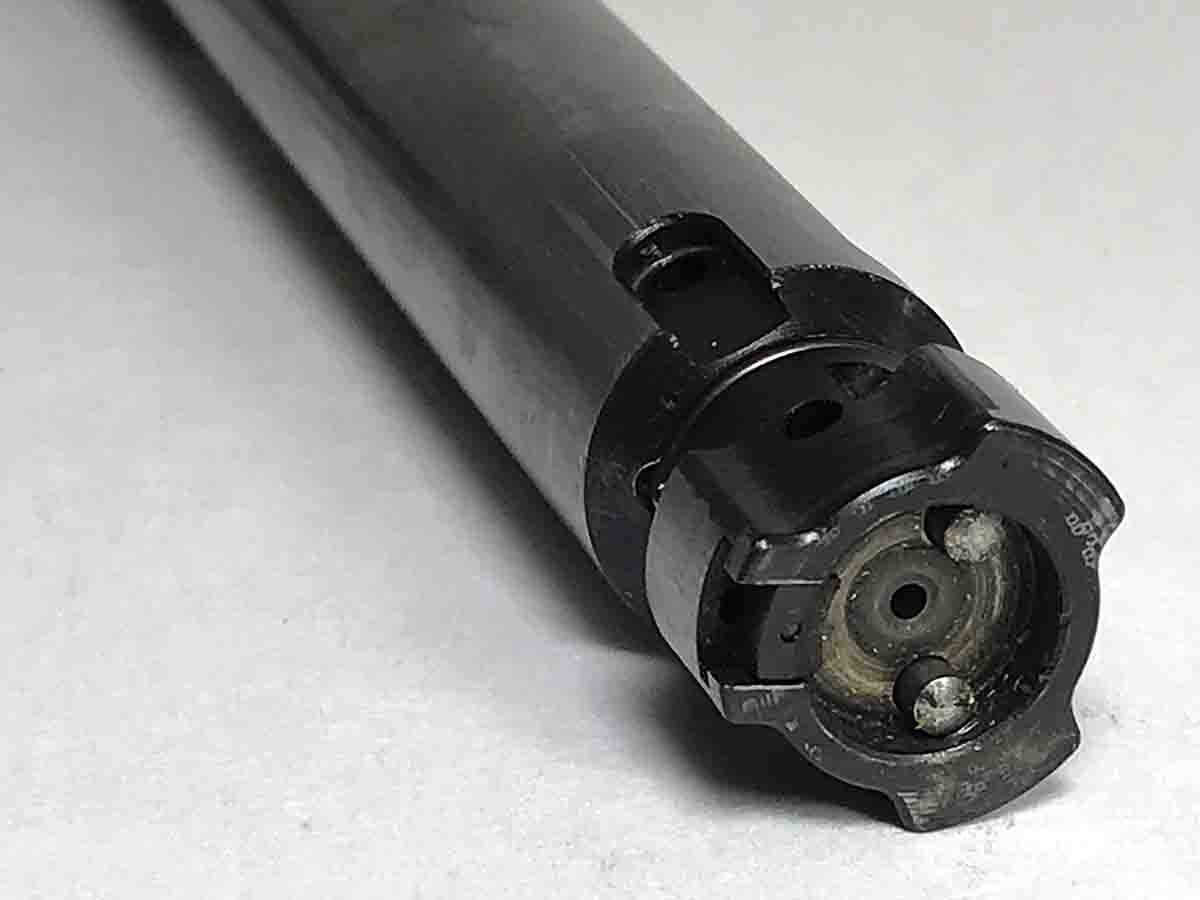 The Sauer 100’s bolt has a sliding blade extractor on the face of one locking lug and two plunger ejectors in the recessed bolt face.